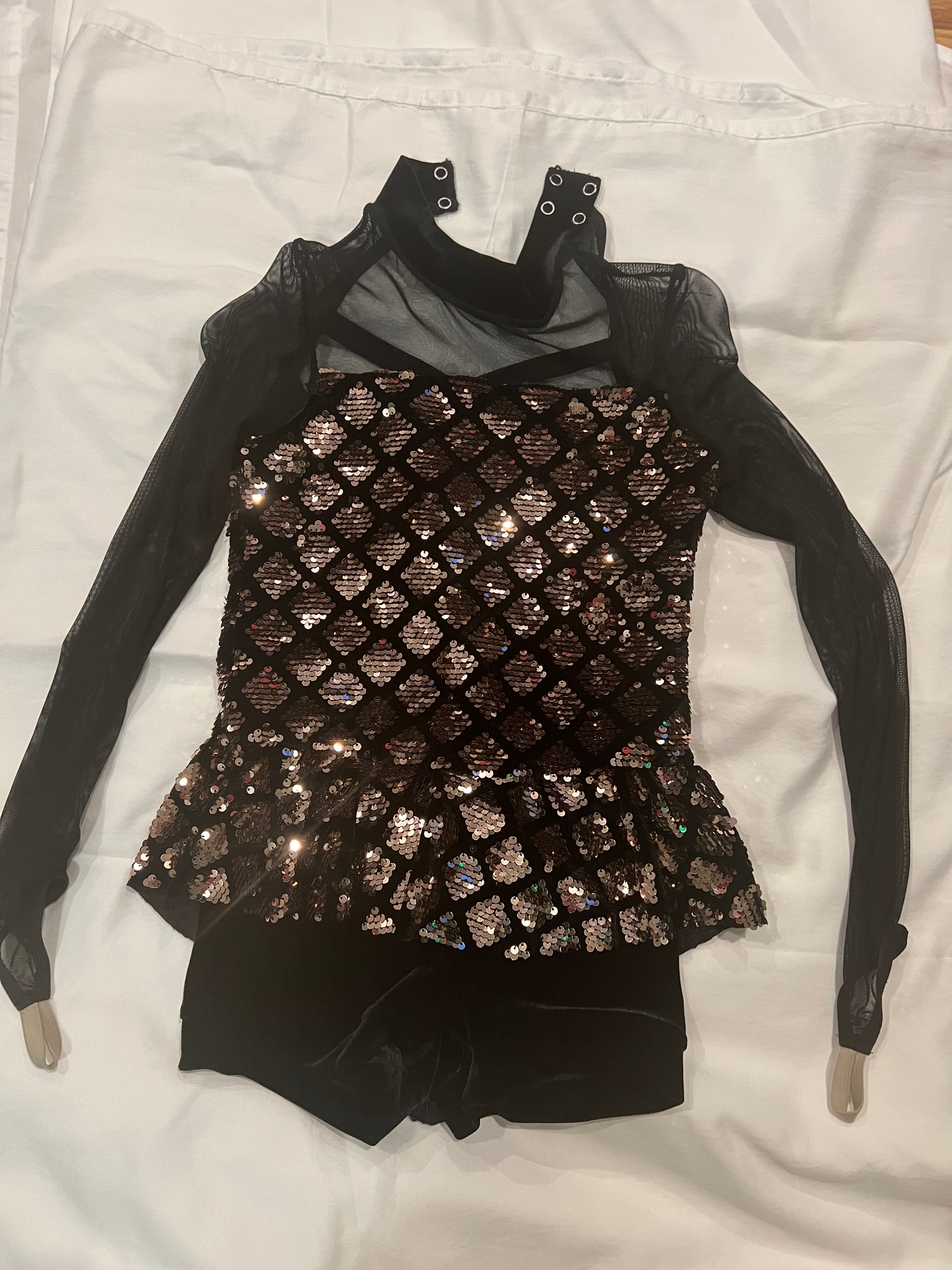 Black and Gold One Piece.   CM