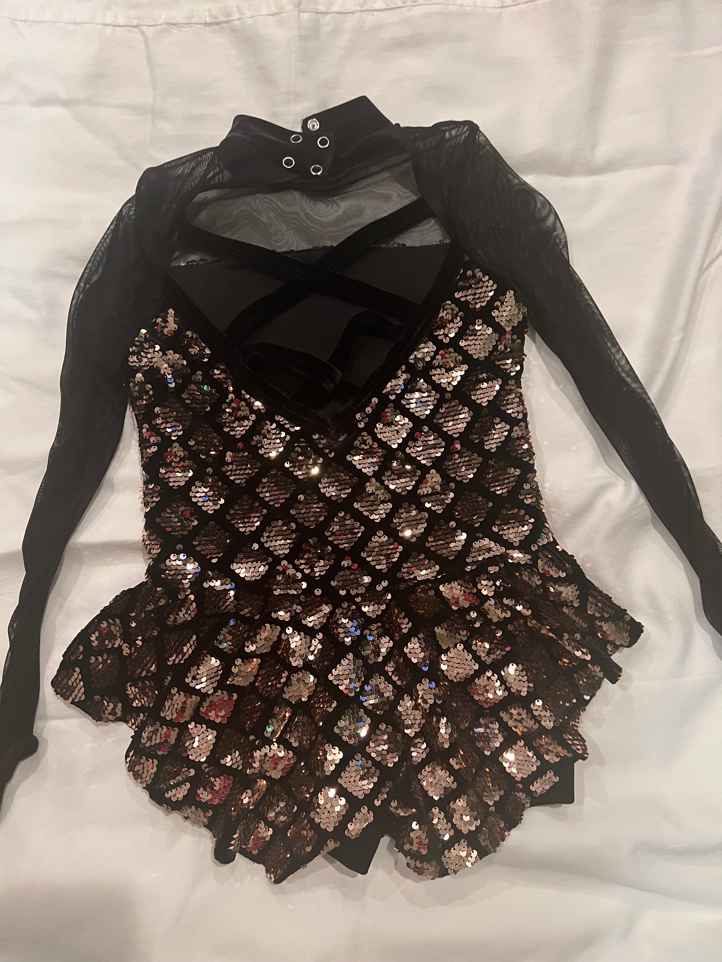 Black and Gold One Piece.   CM