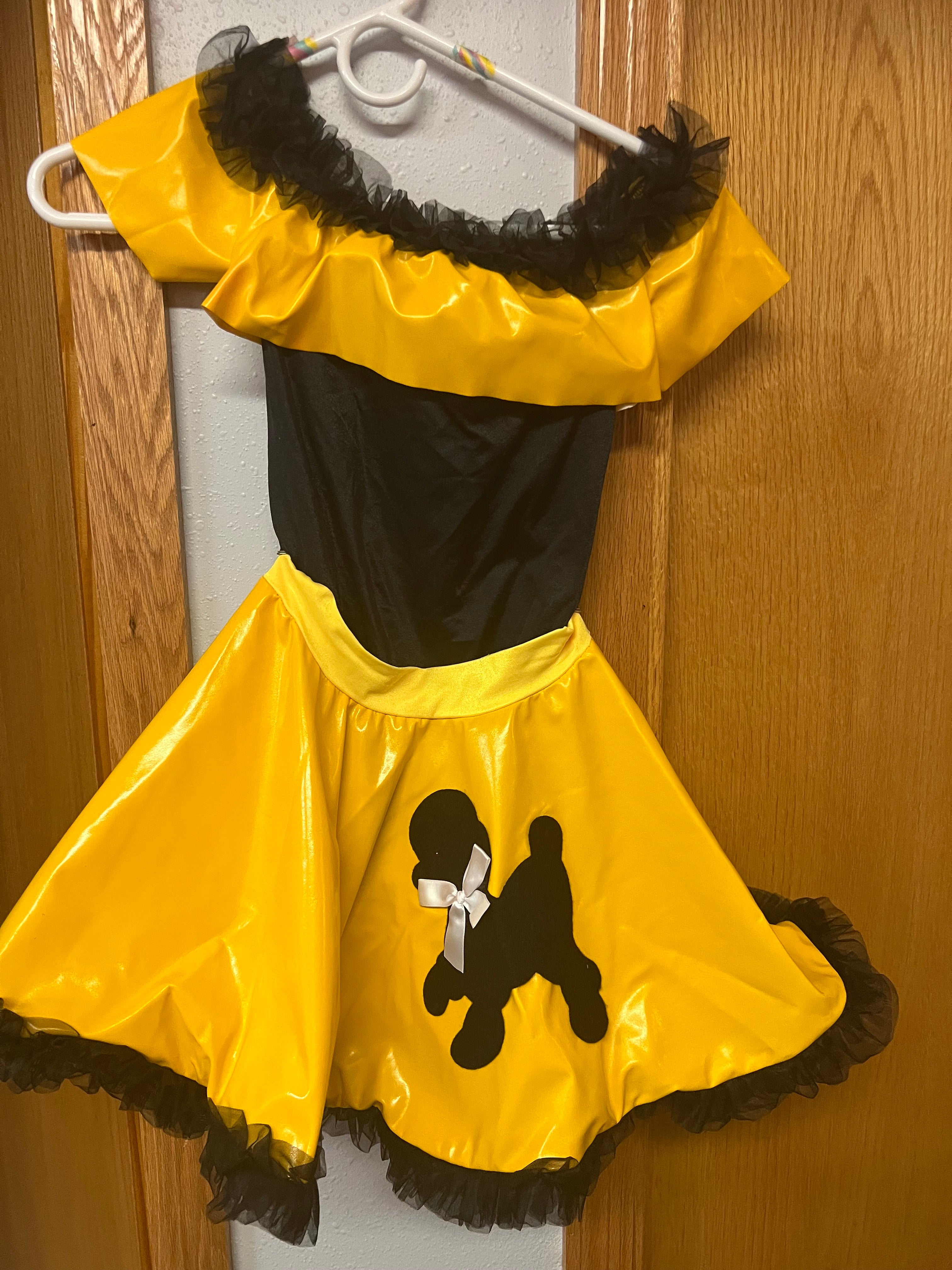 BLACK AND YELLOW TWO PC WITH POODLE SKIRT