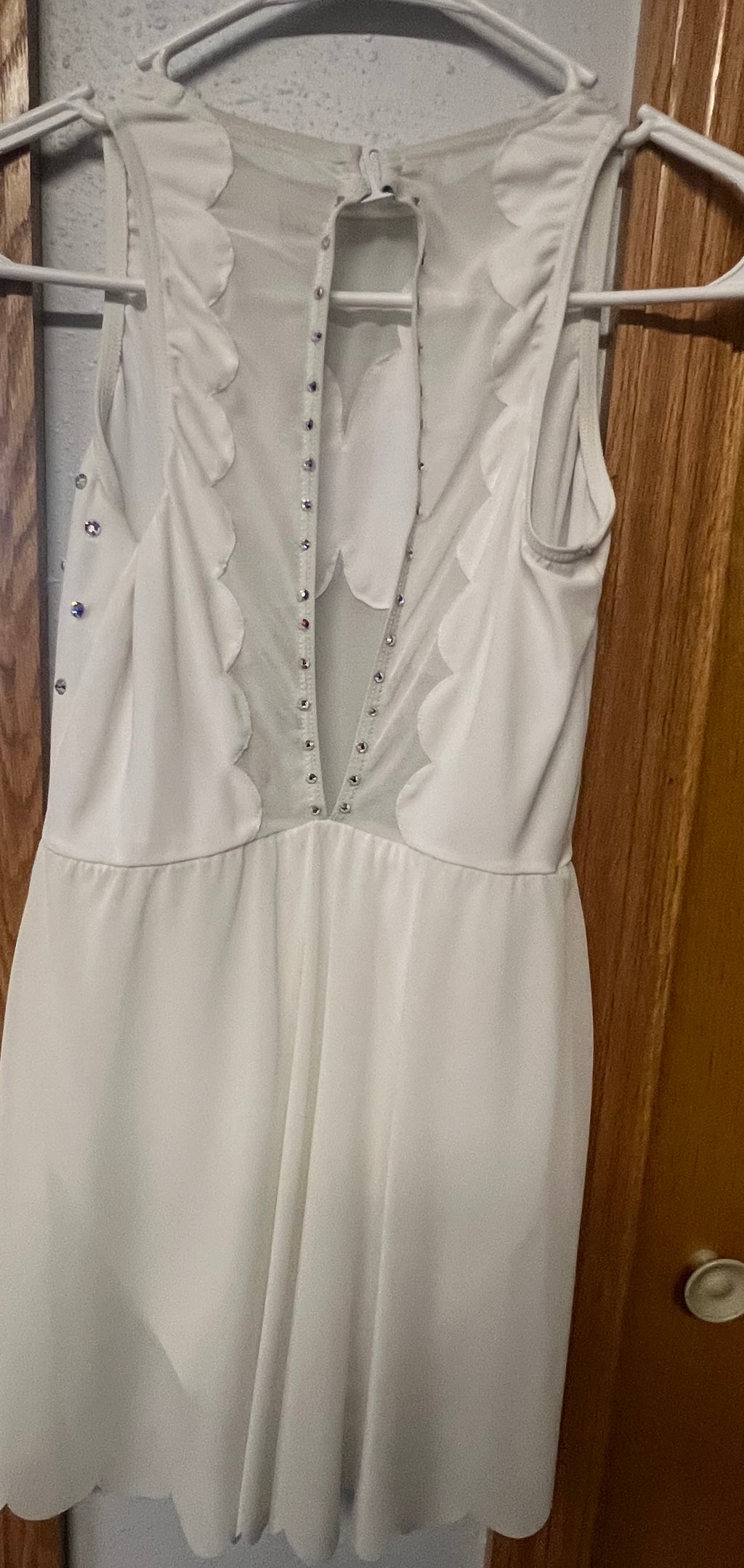 WHITE LYRICAL DANCE DRESSES WITH SWAROVSKI CRYSTALS.