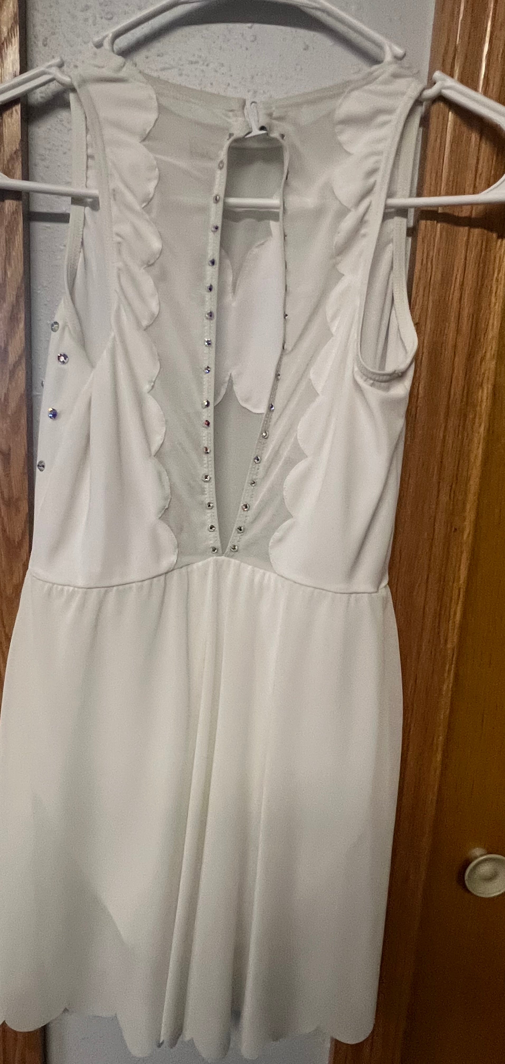 WHITE LYRICAL DANCE DRESSES WITH SWAROVSKI CRYSTALS.
