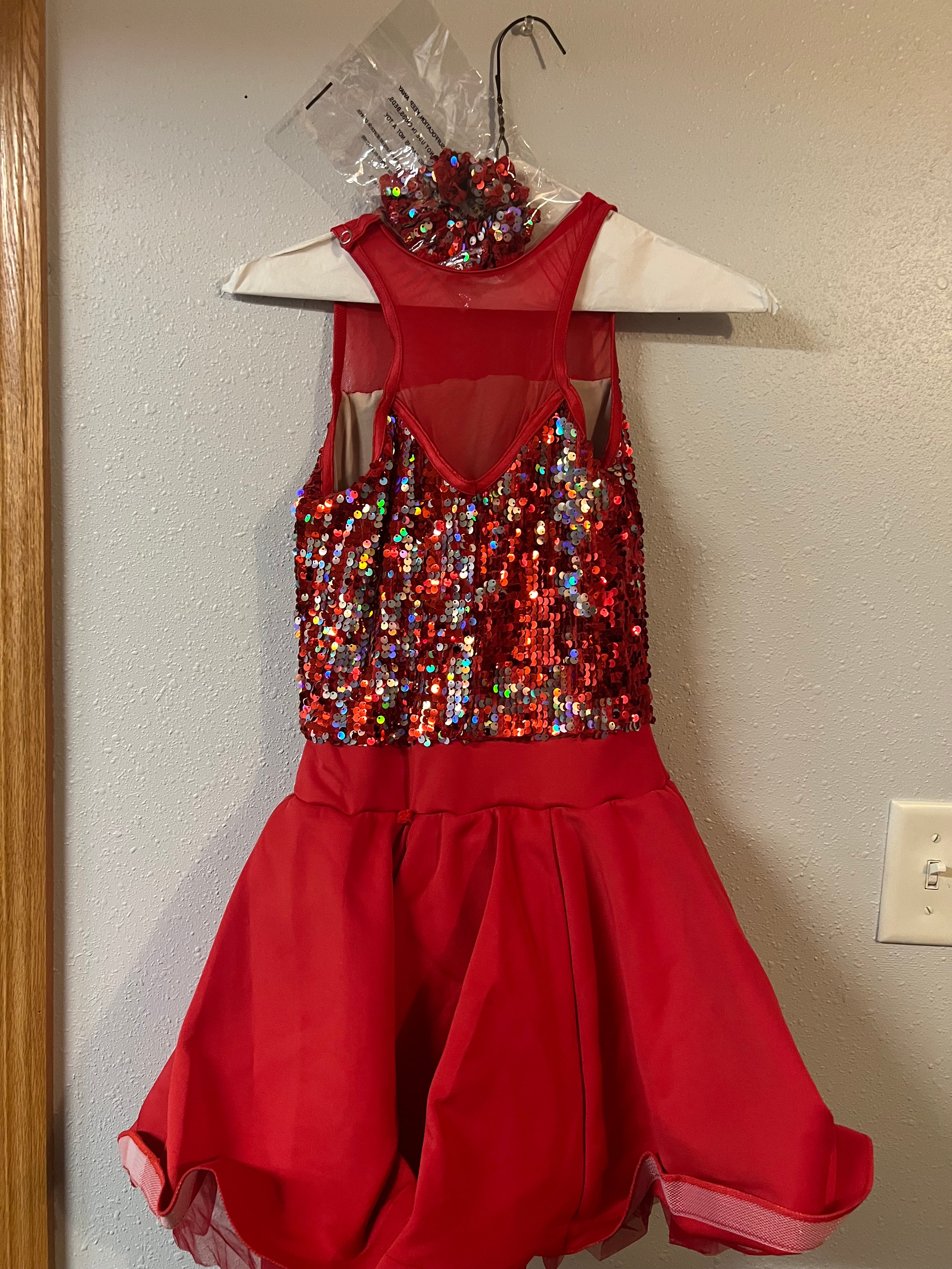 RED JAZZY DRESS.