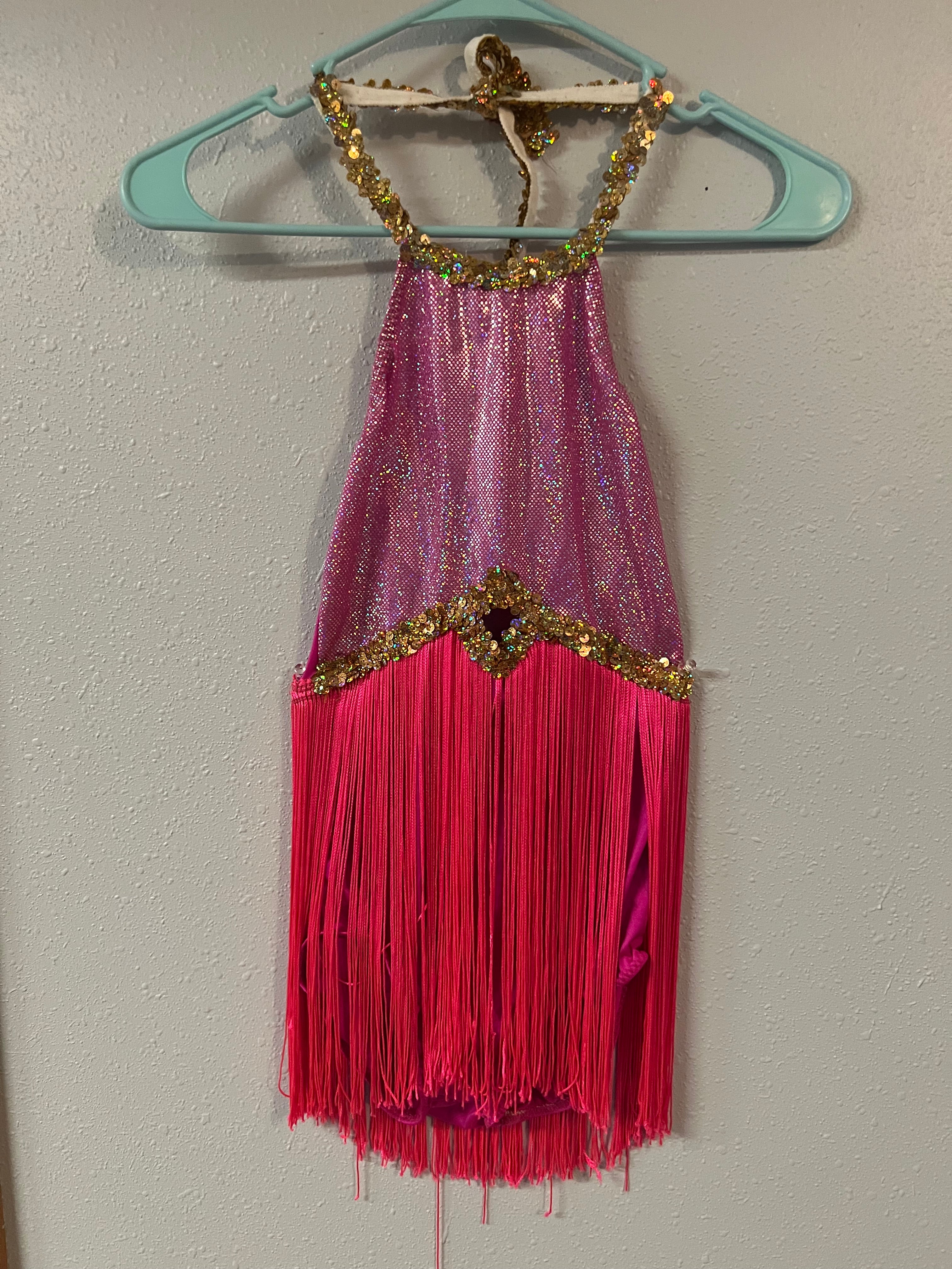 Pink Leo with fringe and gold trim.   CM