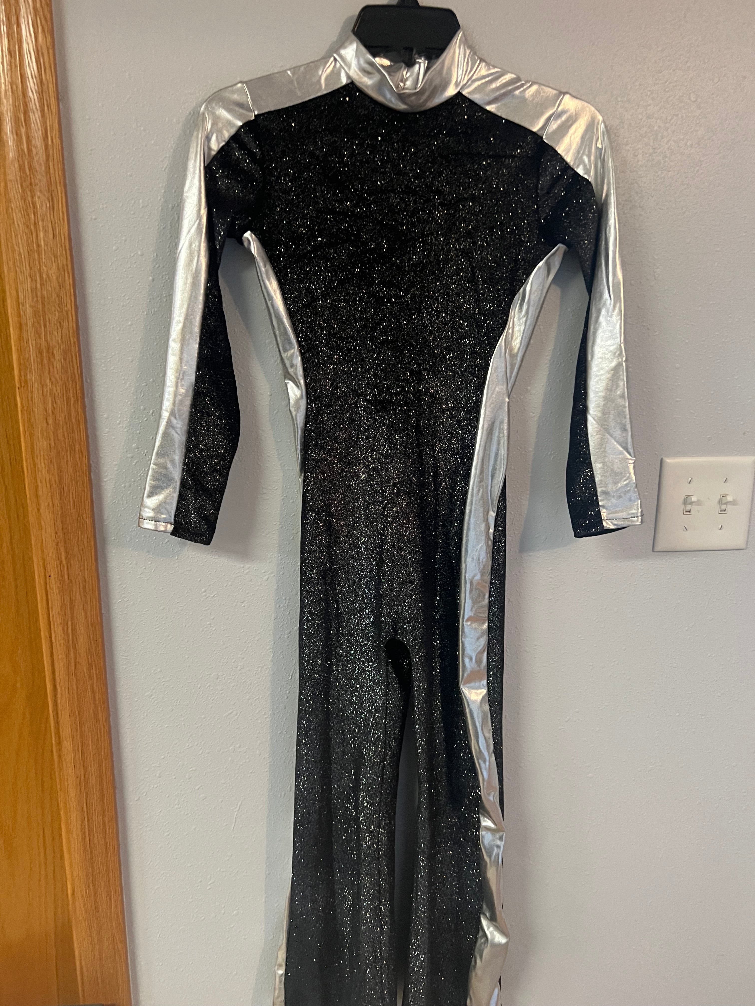 BLACK AND SILVER ONE PIECE JUMP SUIT WITH GLITTER