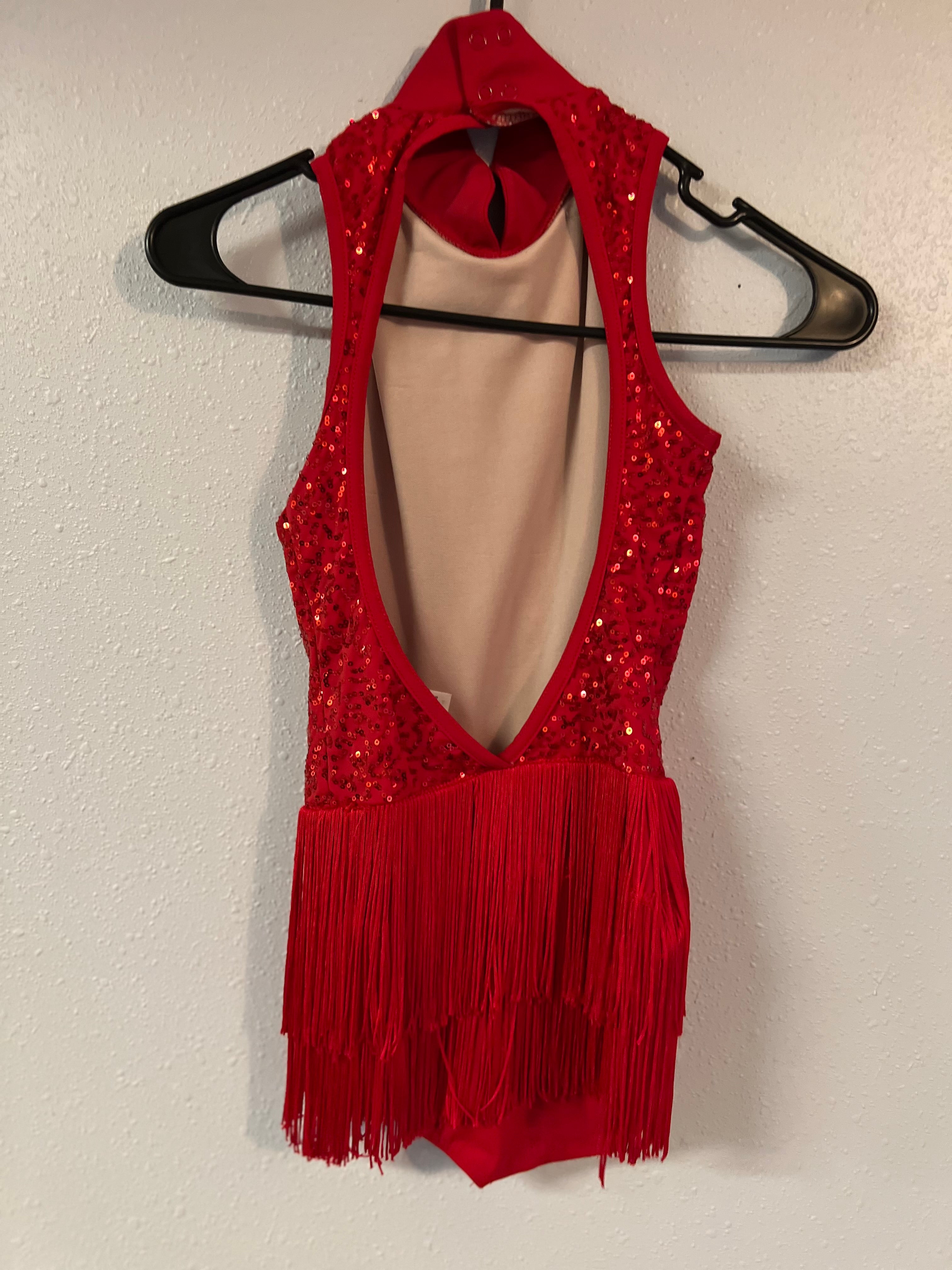 RED ONE PIECE WITH FRINGE SKIRT